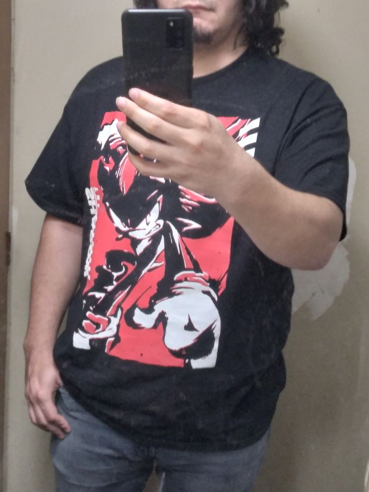 Picture of me wearing a Shadow the Hedgehog shirt.