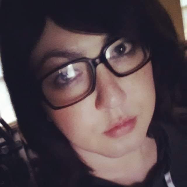 It me in a hoodie and fake glasses.