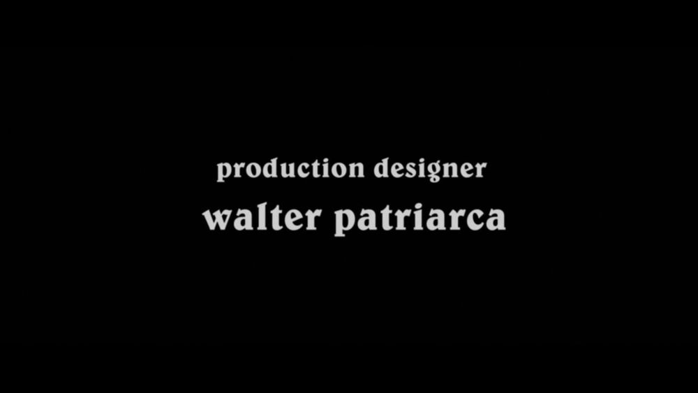 Screenshot from the opening credits to Zombi 2 / Zombie Flesh Eaters: "production designer walter patriarca"