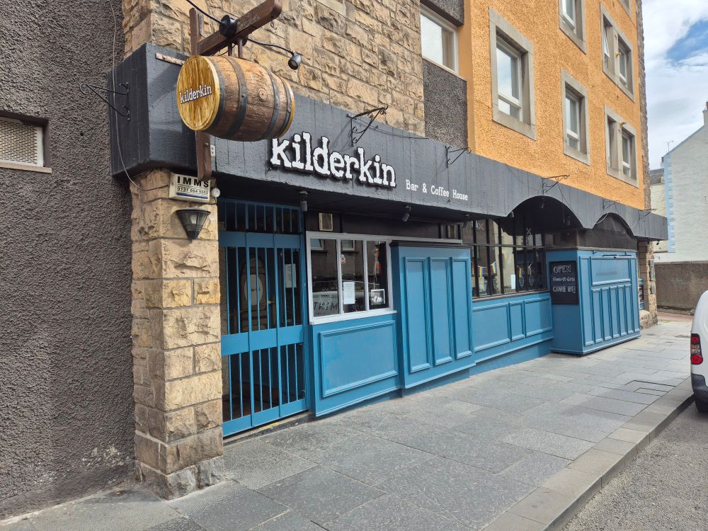 Exterior view of a pub called Kilderkin, with a small barrel hanging over the door