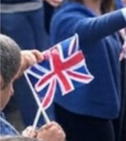 An alleged Union Jack flag except one of the diagonal stripes is blue not red. 
