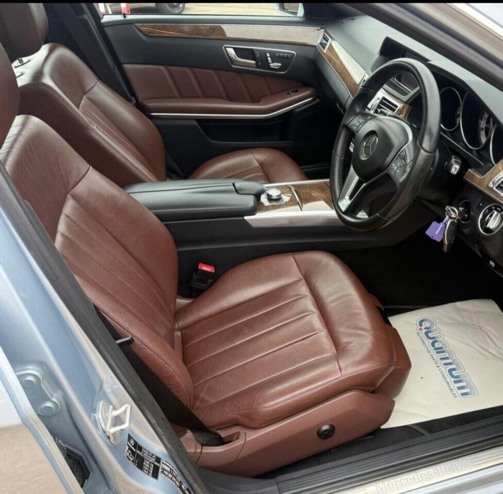 Car interior. All look pretty standard, but the seats and door cards are a melted milk chocolate colour, the shiny leather enhances this greatly. 