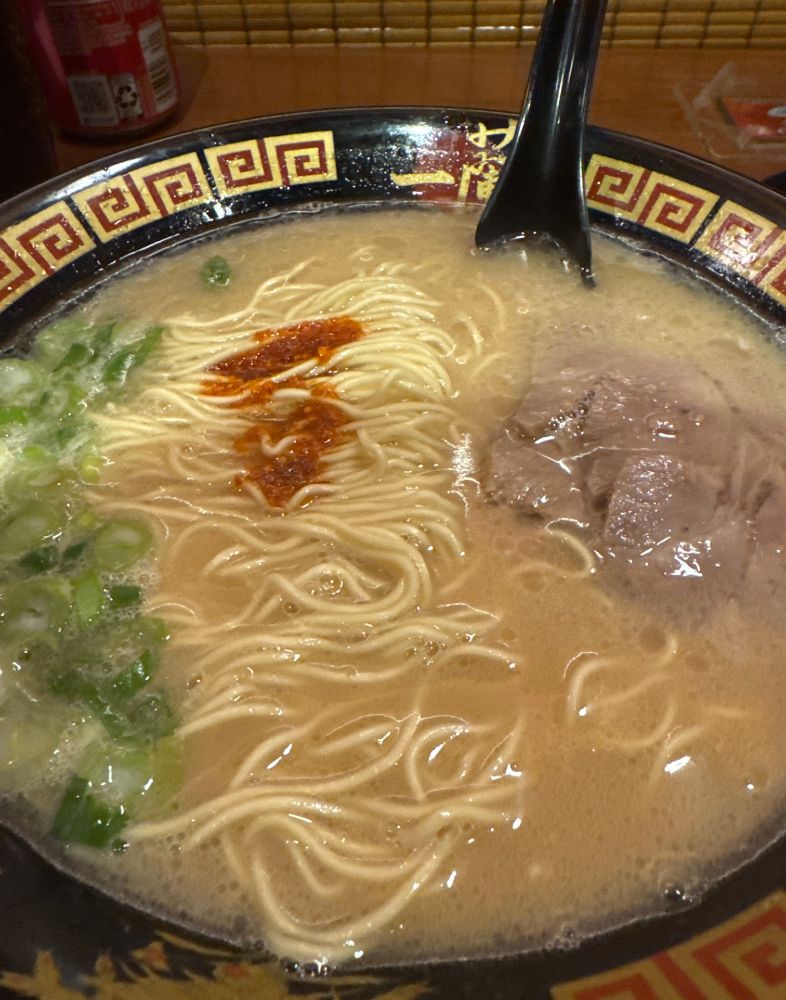 Ichiran tonkotsu ramen with scallions, chashu pork and spicy pepper sauce 