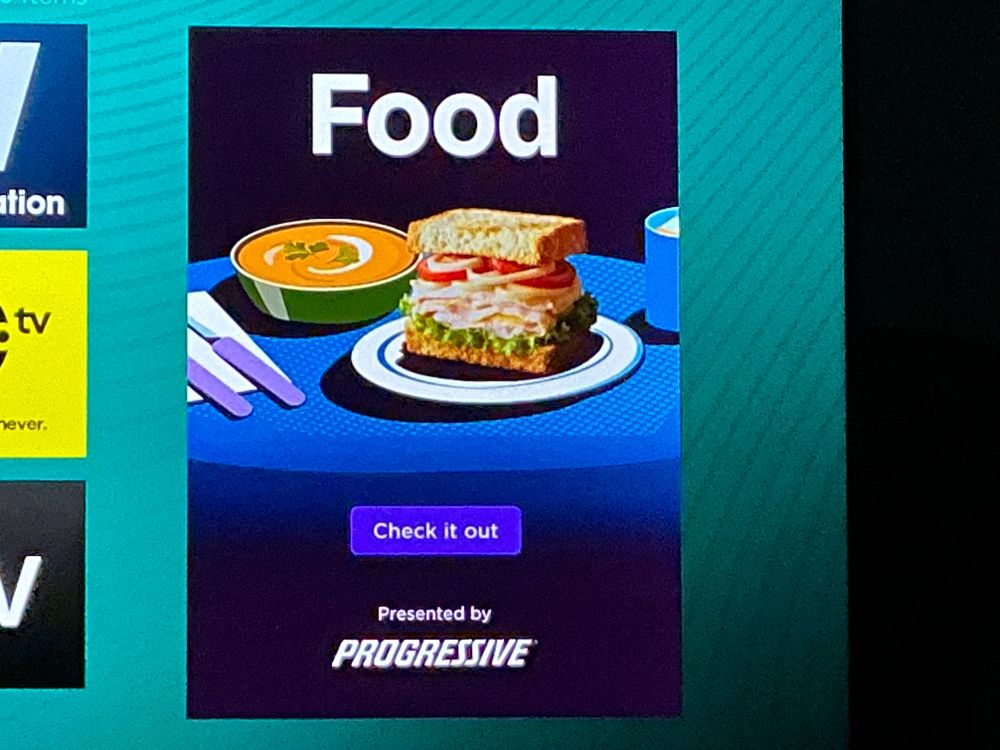 an ad on my Roku TV for "Food, presented by Progressive", depicting a photorealistic sandwich next to a cartoon bowl of red soup