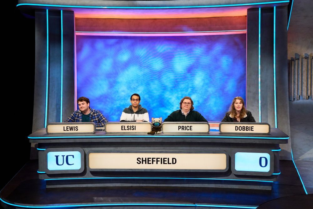 Picture of students on University challenge, left to right named (surnames) Lewis, Elsisi, Price and Dobbie