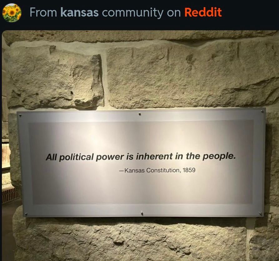 A picture of a plaque in Kansas that reads “All political power is inherent in the people - Kansas Constitution, 1859