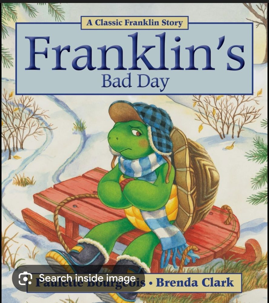 Franklin's bad day- a grumpy looking turtle wearing winter outerwear sits with folded arms
