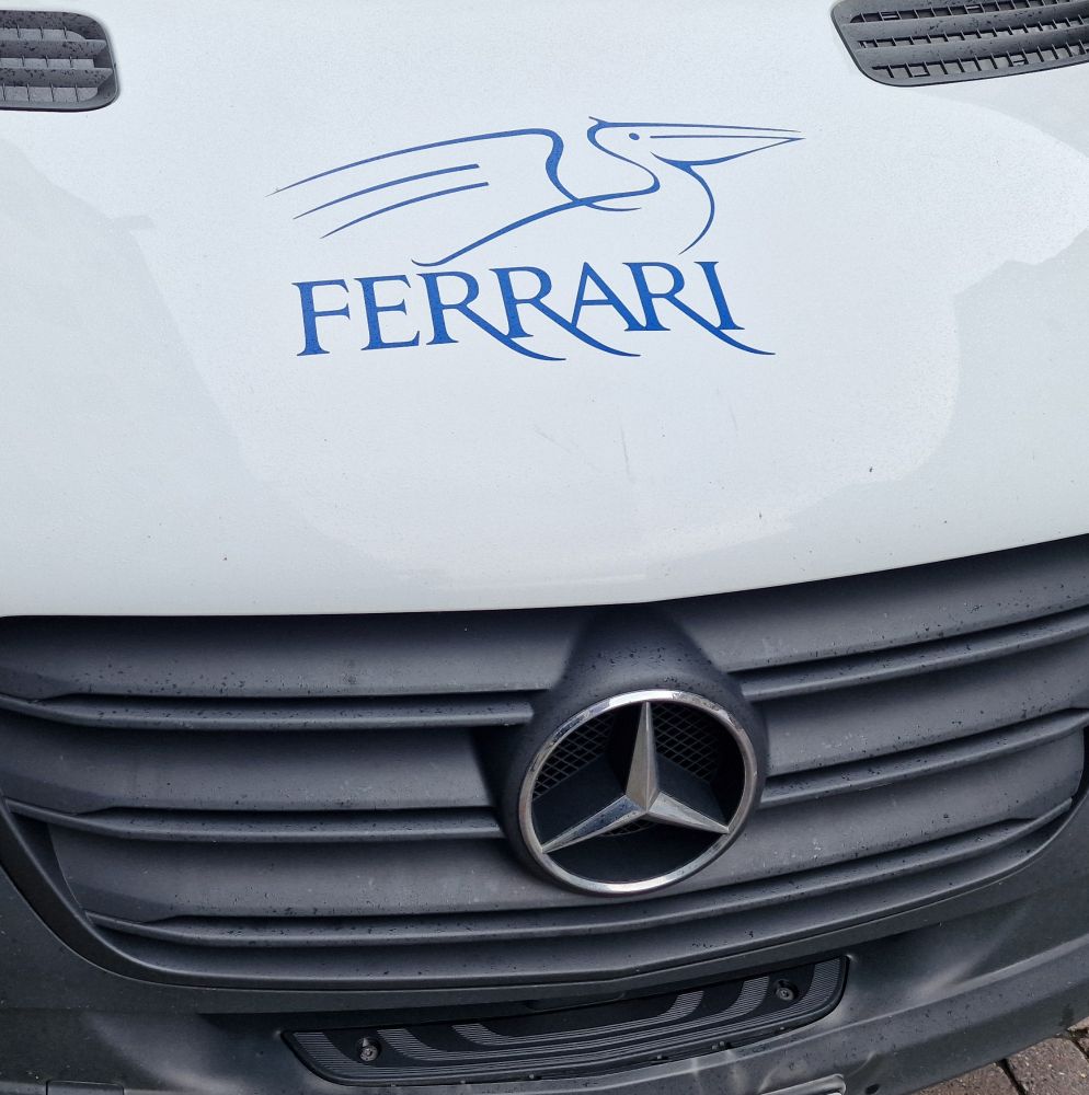 Mercedes van, but the company name is Ferrari.