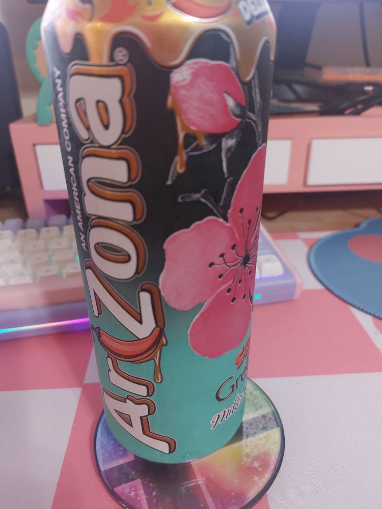 Photo of a can of Arizona Ice Tea. It is Spicy Green Tea flavour with Mike's Hot Honey