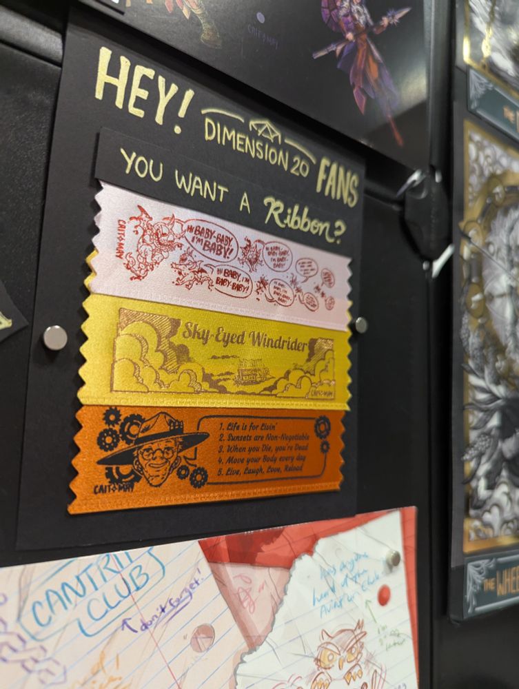 Three badge ribbons: Baby and Baby-Baby all the way down; "Sky-Eyed Windrider"; and Pappy's Rules for Livin'