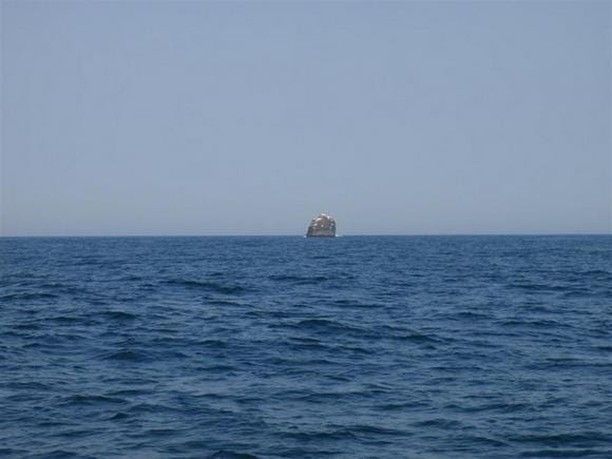 Rockall on the horizon, a distant nib of rock in the open sea, like the tip of a colossal pencil sticking out into open air.