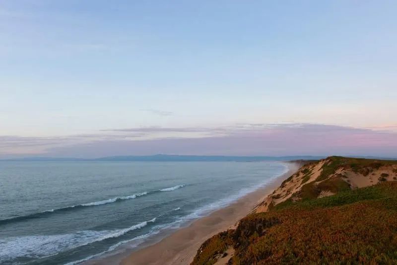 A placid view of Monterey Bay at dusk.