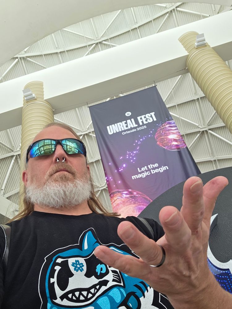 My ugly mug standing in front of the Unreal Fest conference banner.