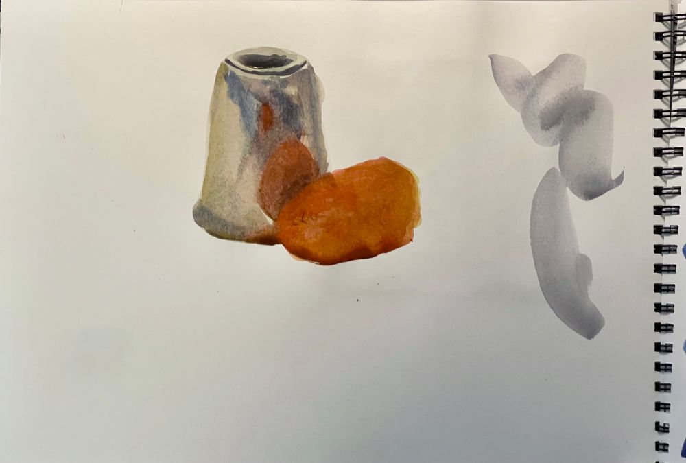 A watercolour sketch of a metallic cup and a cashew. Cashew is left unfinished