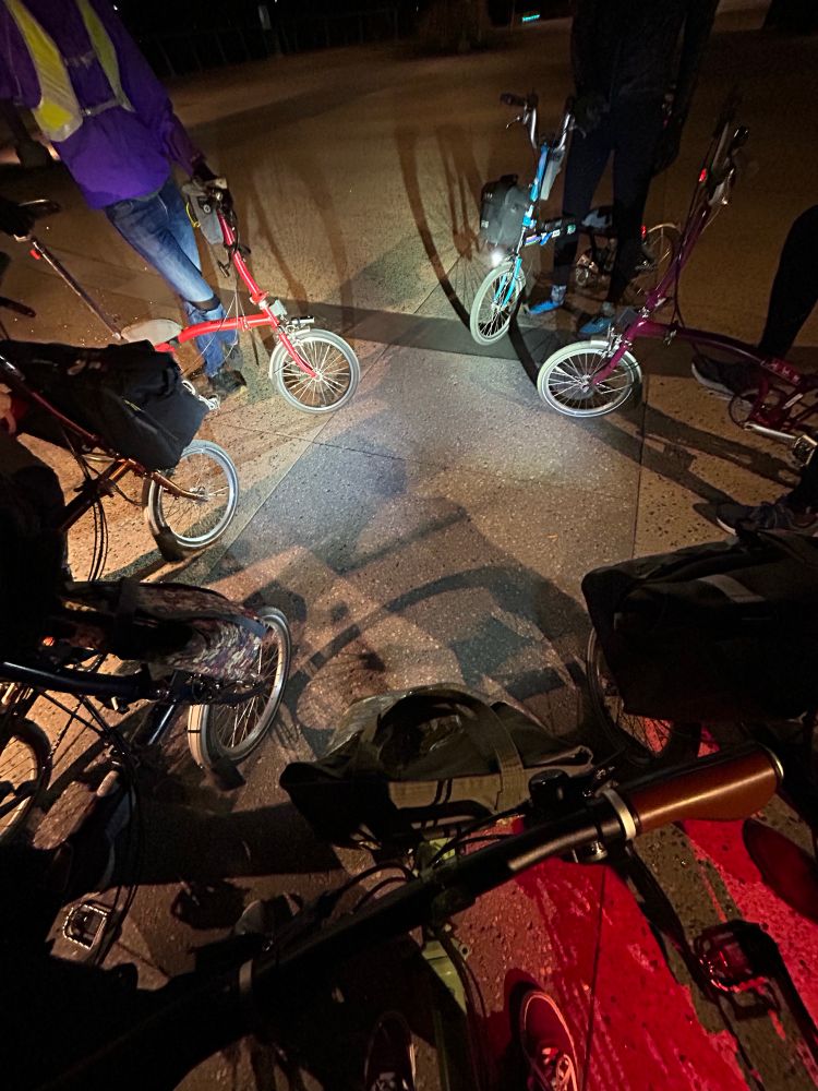 A circle of Brompton riders.