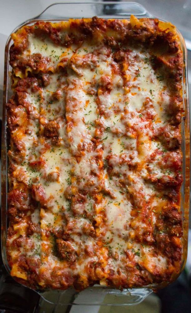 This is hands down the Best Lasagna Recipe ever! Layer hearty meat sauce with three cheeses and lasagna pasta and bake until hot and bubbly.