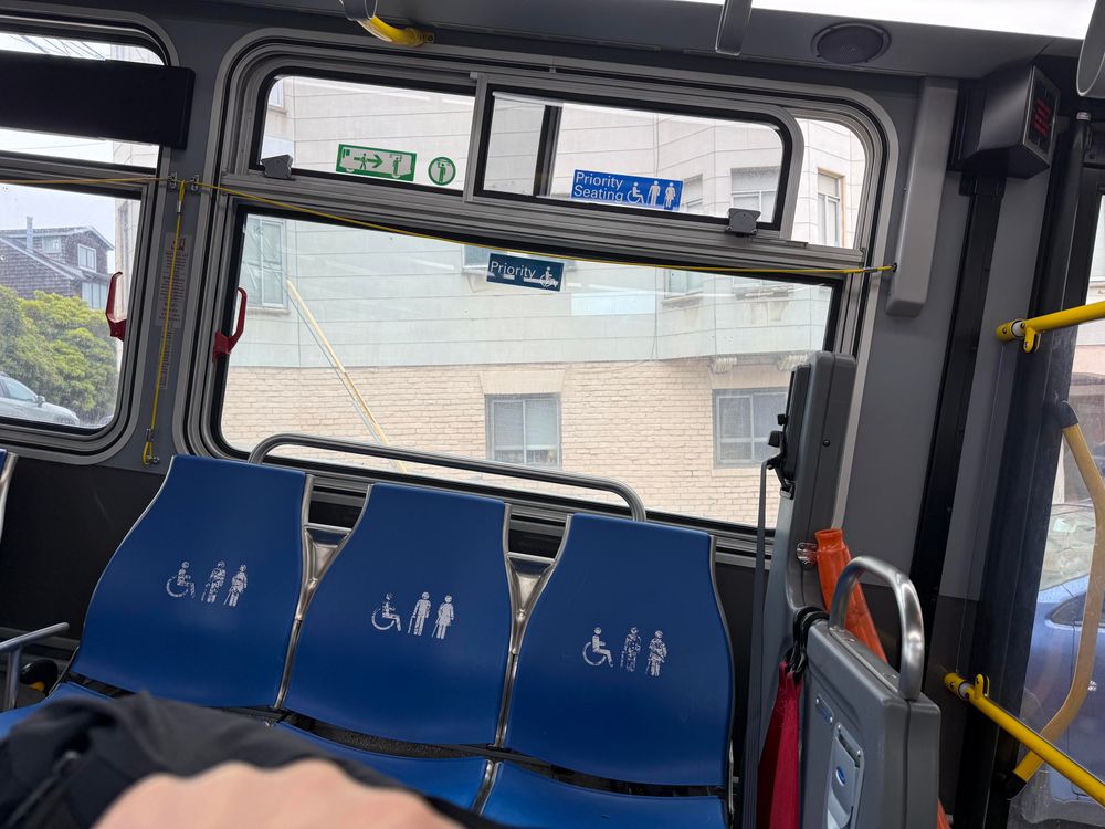 Shot inside a bus aligned with the outside, showing the bus at a fairly steep uphill angle 