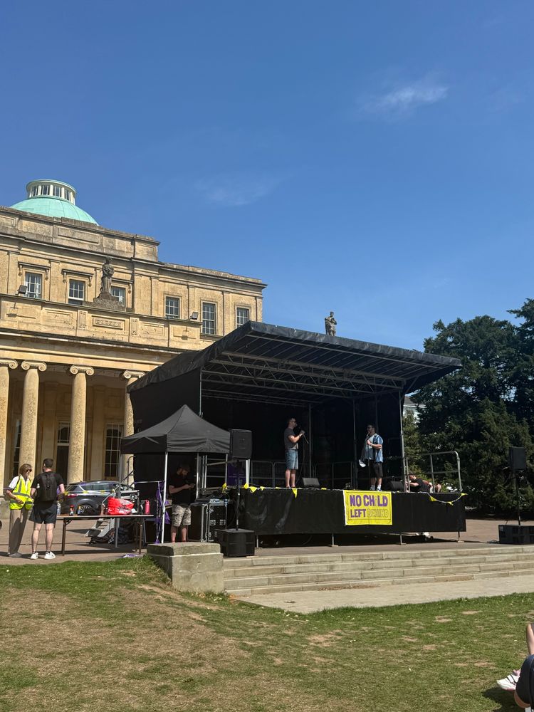 A picture of a stage in front of a building 