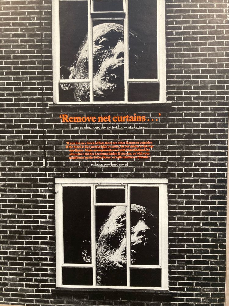 Two windows with a larger than life sized burned face behind them. The text, Remove net curtains, in orange. Image is black and white.