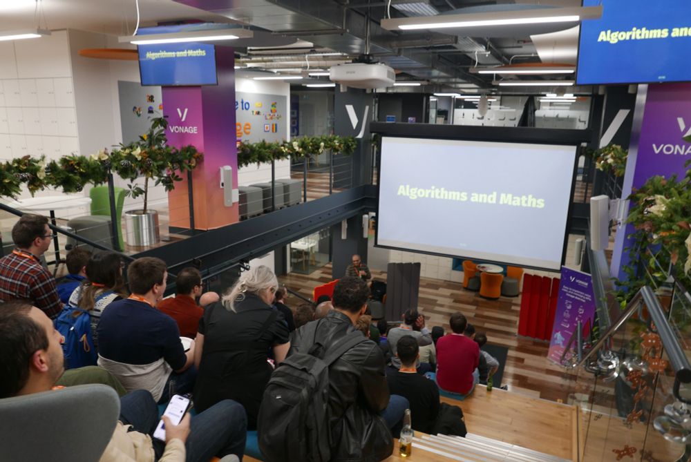 A photo of the audience from the back. 