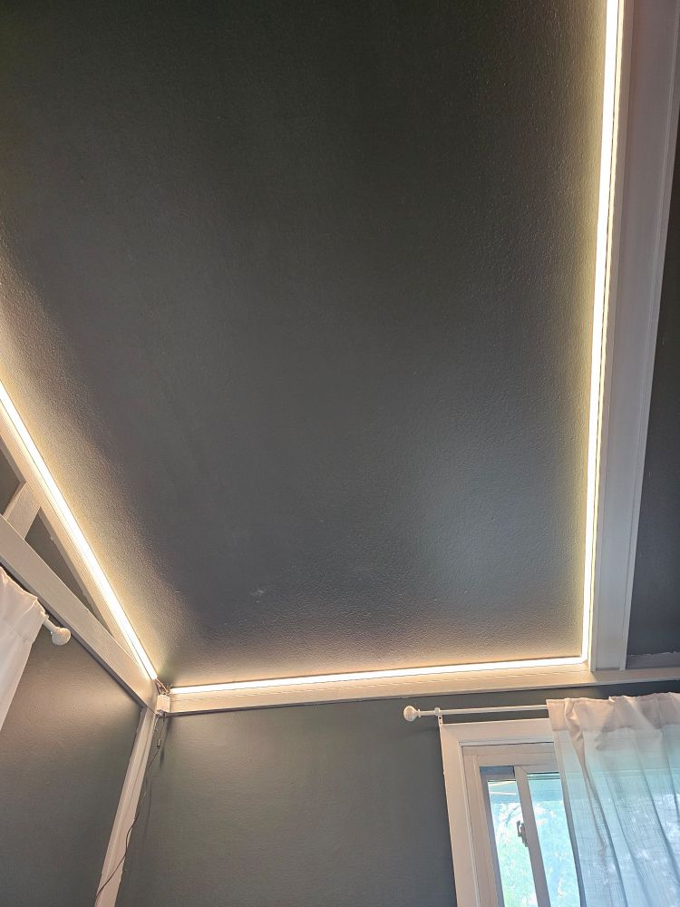 A picture of a newly installed led strip for bedroom lighting. Its white in this photo. 