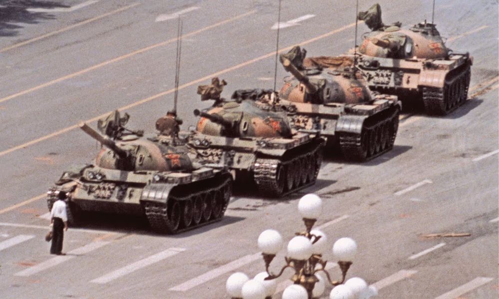 The Tank Man (also known as the Unknown Protester or Unknown Rebel) is the nickname given to an unidentified individual, presumed to be a Chinese man, who stood in front of a column of Type 59 tanks leaving Tiananmen Square in Beijing on June 5, 1989.

Photo by Jeff Widener