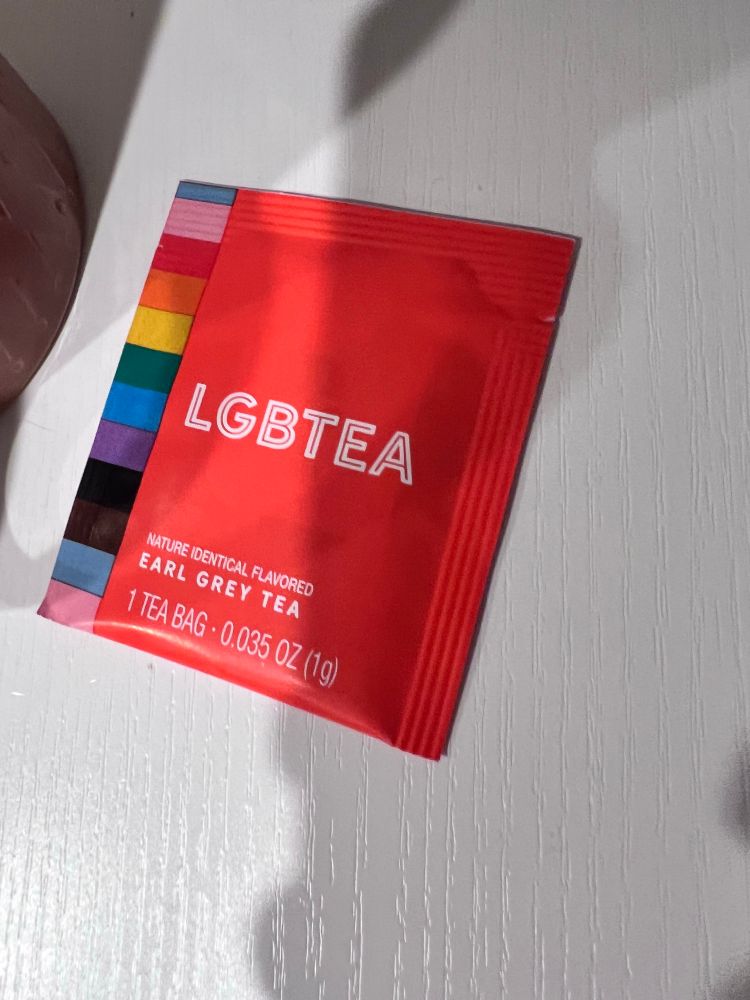 A red packet of LGBTEA, which is earl grey with a rainbow on the left edge 
