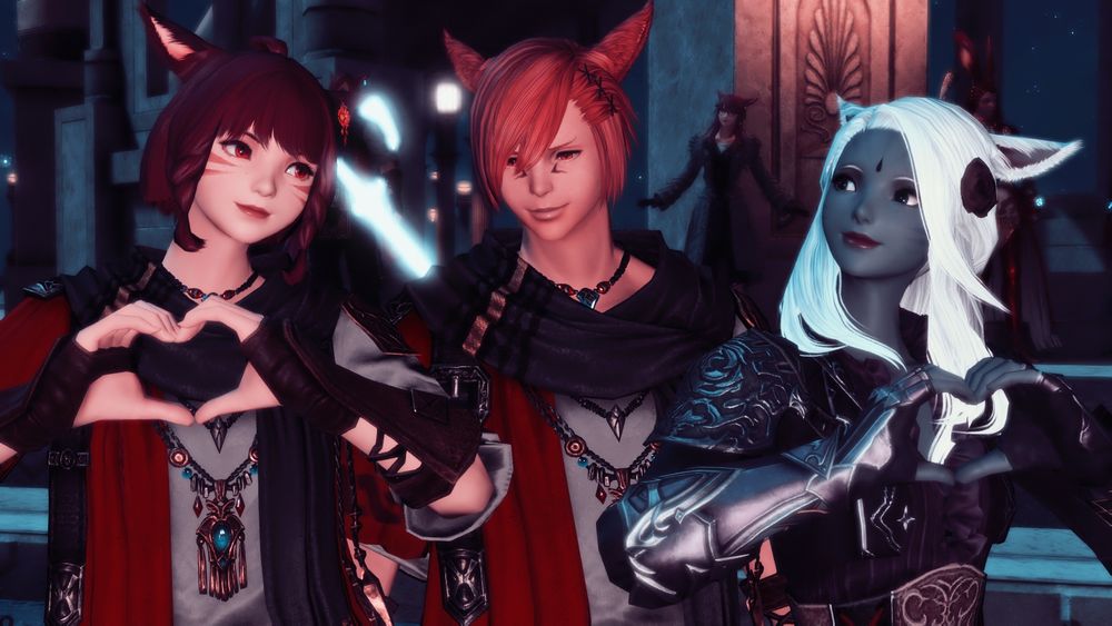 Asteria and Valenice sandwich G'raha with heart emotes