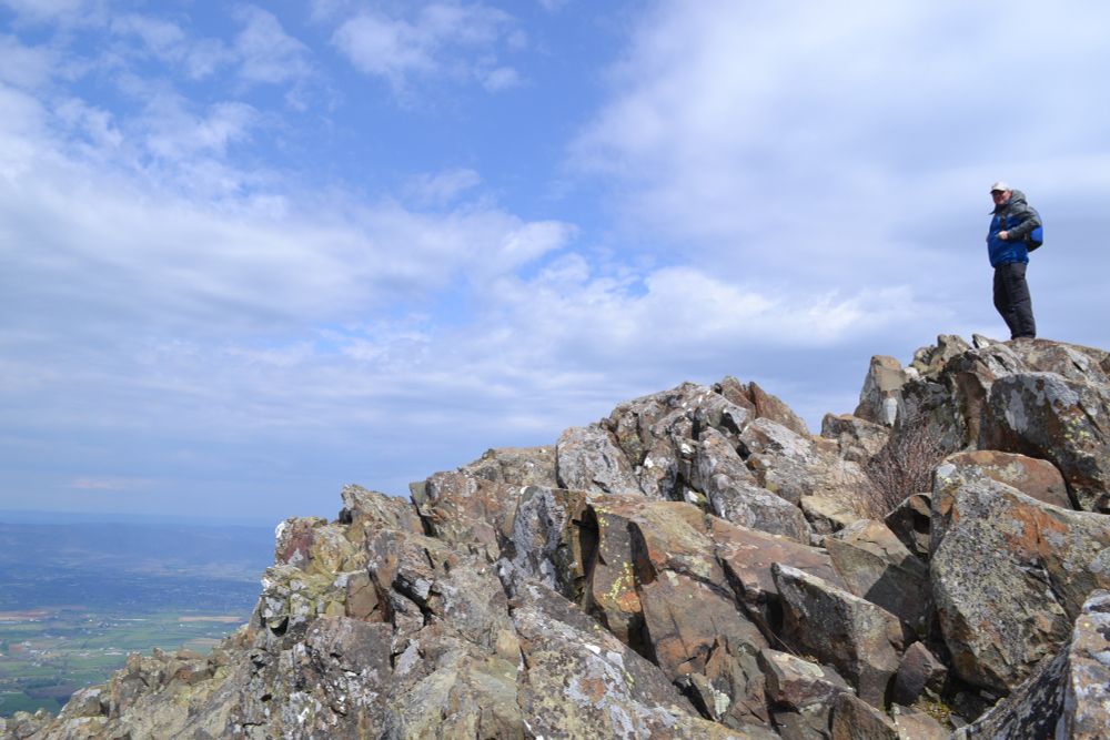 Senator Kaine standing on peak of mountain in Shenandoah National Park.