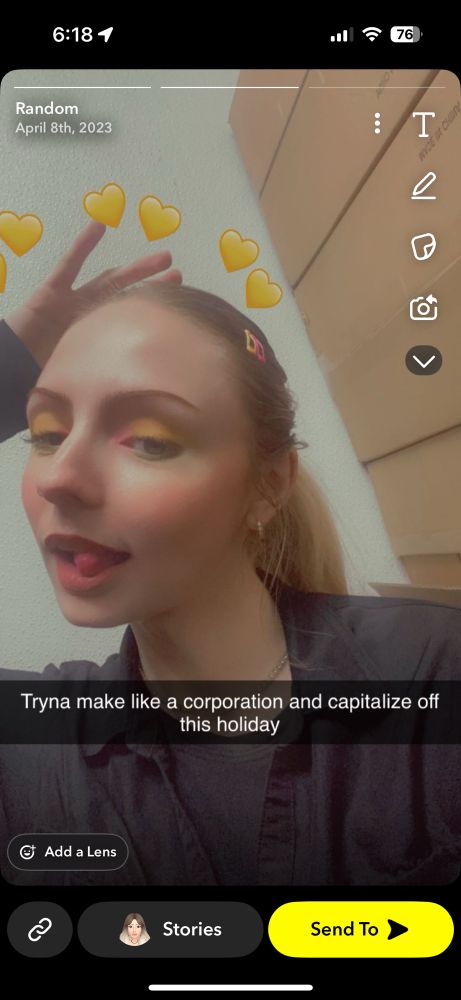 a picture of me with my tongue out, wearing my serving uniform when I used to work at a restaurant, I captioned it on snapchat saying “Tryna make like a corporation and capitalize off this holiday”