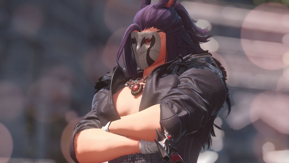 Zinaida Kirkegrim with her arms crossed and looking down at the viewer. Dreamy pinkish light fills the view