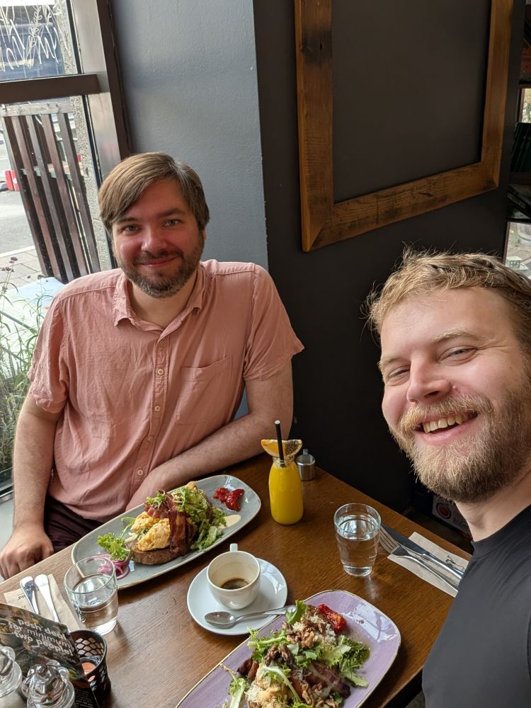 Me and my friend taking a selfie with a big brunch.