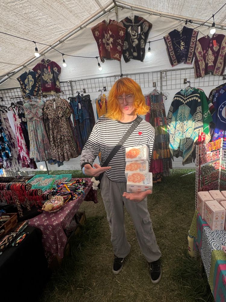 Me holding a money spread of labubu 