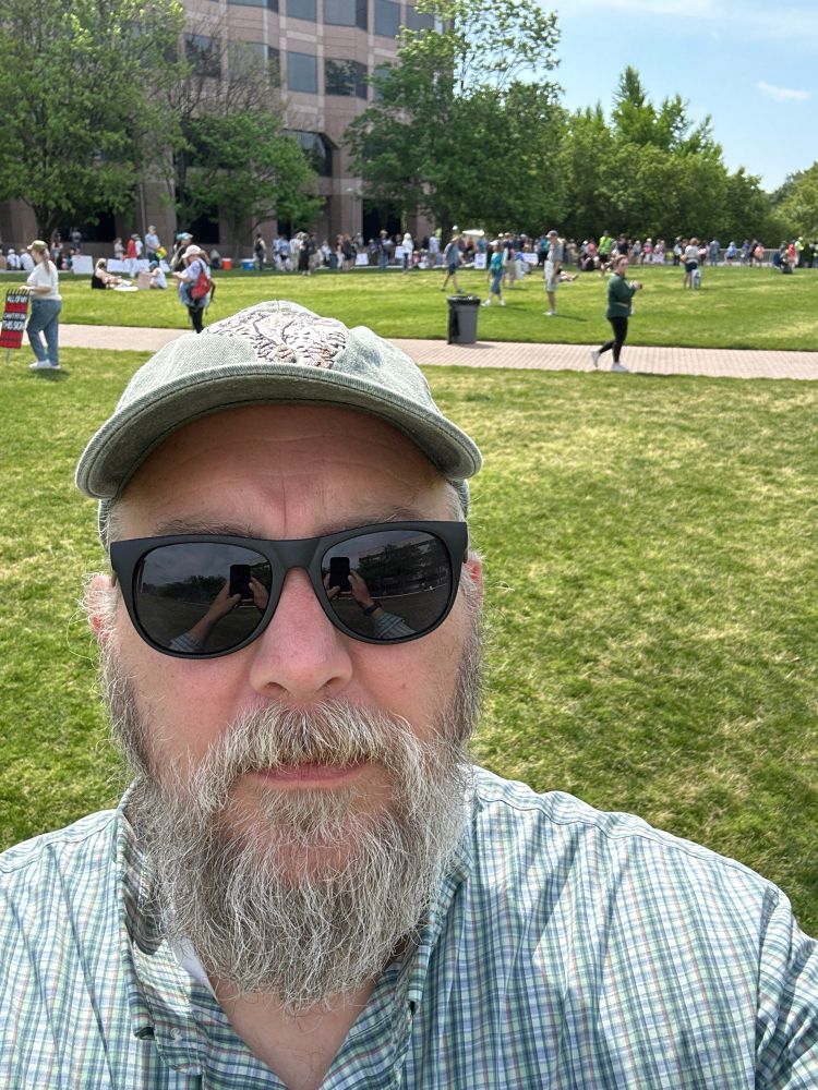 Me, standing in front of a growing protest crowd. 