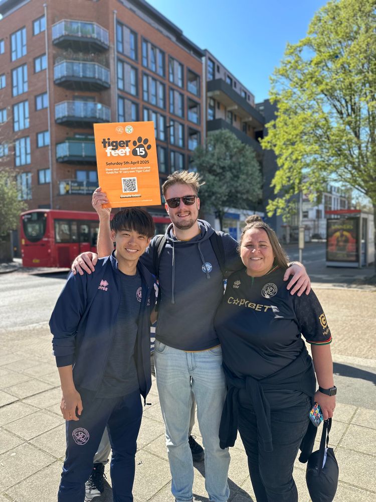 Loki Saito with two QPR fans on the Tiger Feet Walk. Sponsor us here: https://www.givengain.com/project/rainbow-raising-funds-for-qpr-in-the-community-trust-93949