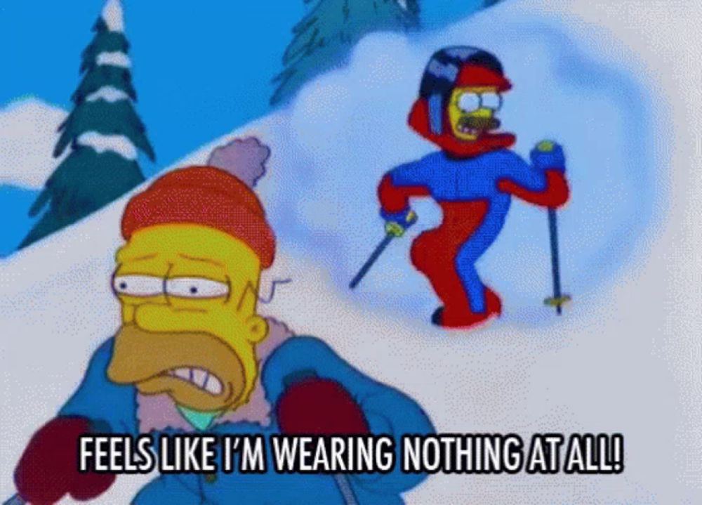 a cartoon character says " feels like i 'm wearing nothing at all " as he skis down a snowy hill