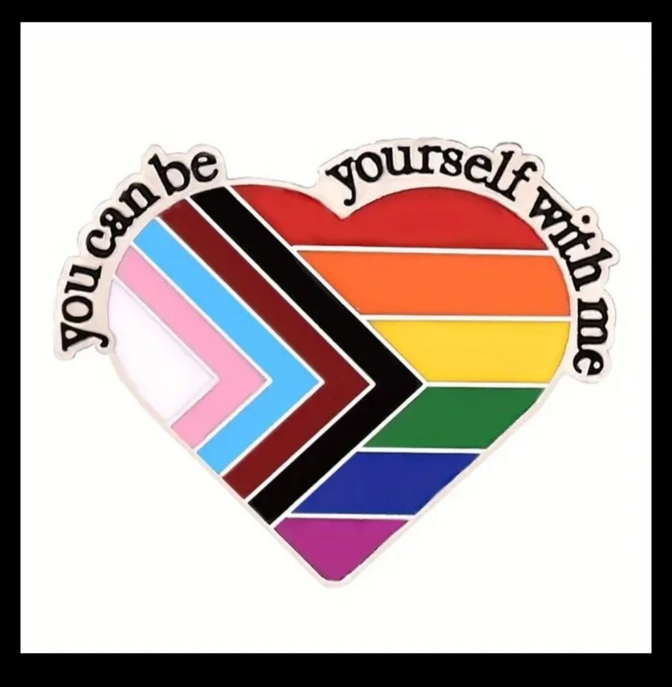 All inclusive rainbow flag in a heart with the text "you can be yourself with me"