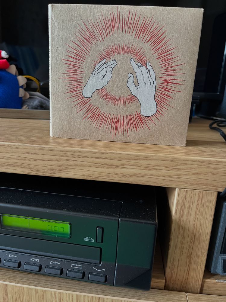 Godspeed You! Black Emperor’s Lift Yr Skinny Fists To Heaven album playing on the CD player
