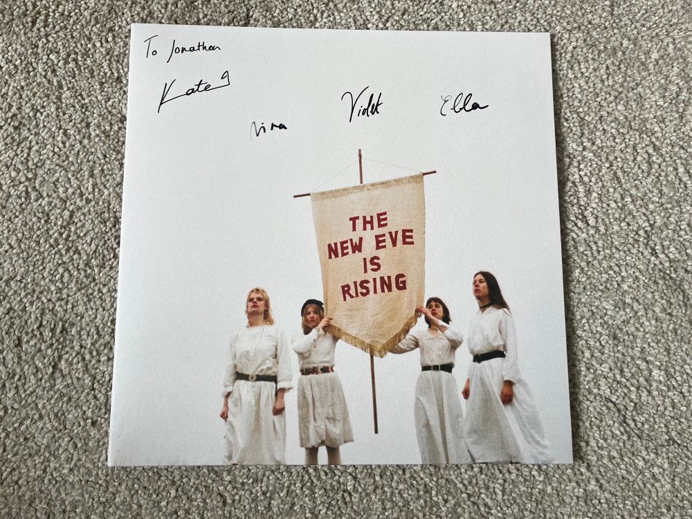 The New Eve Is Rising on vinyl, signed by the band