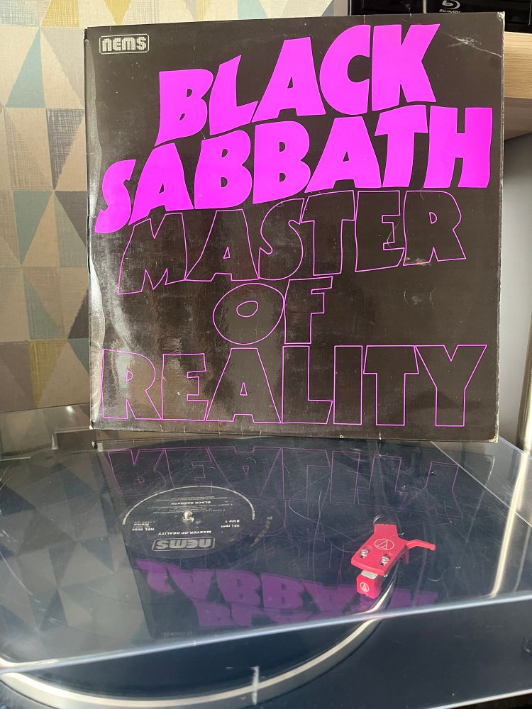 Black Sabbath’s Master of Reality playing on the record player 