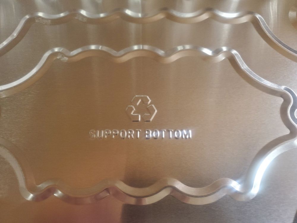 Text "support bottom" on bottom of foil pan.