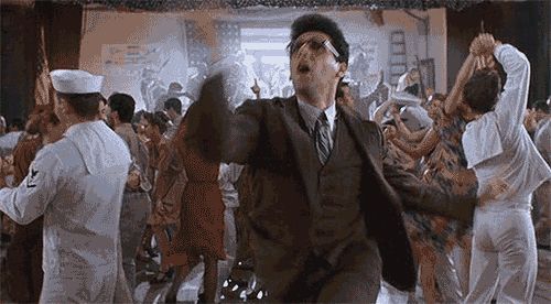 John Turturro as Barton Fink, dancing ecstatically 