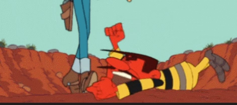 Joe Dalton piquant sa crise à plat ventre par terre.