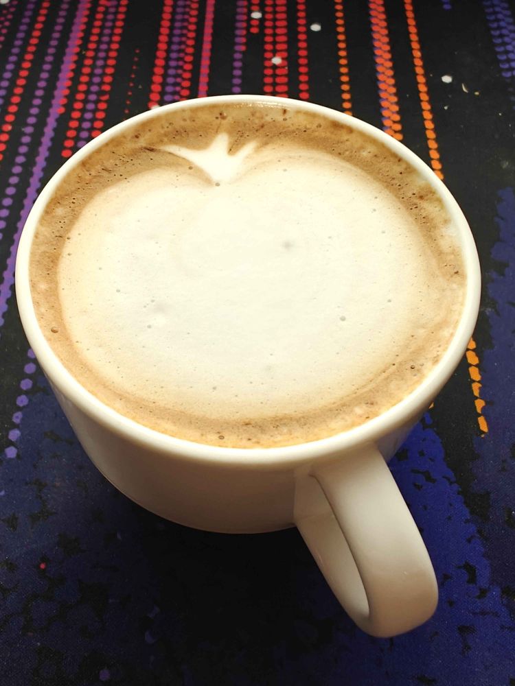 Latte with an attempt at latte art