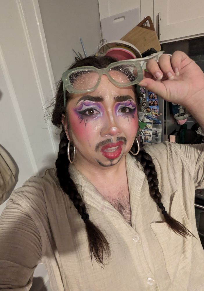 Drag king soaking wet with makeup running down the glitter got in my eyes and BURNED