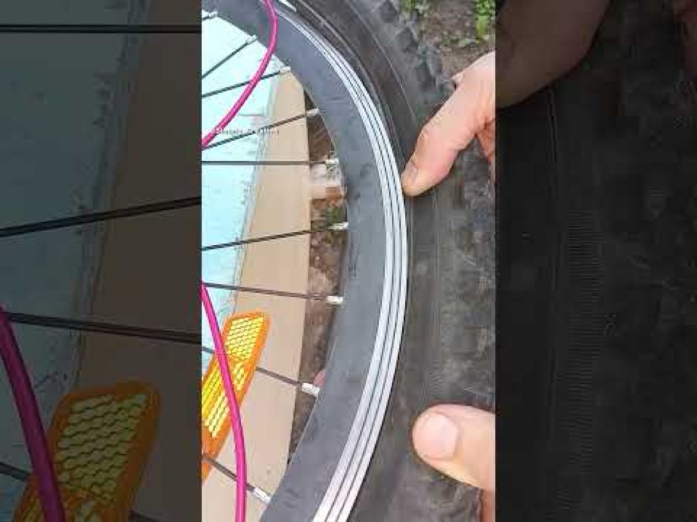 Every Cyclist Should Know This Trick! How to Easily Put on a Bicycle Tire #shorts #bike #tips