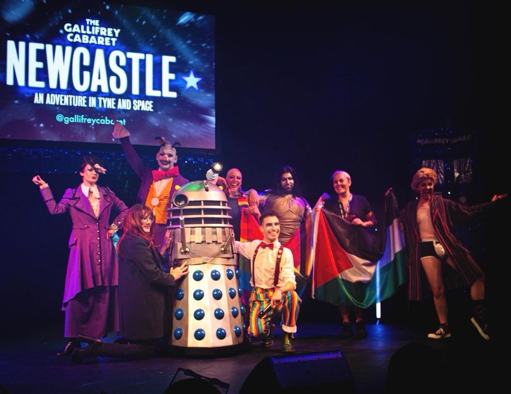 The whole gorgeous cast onstage at curtain call.