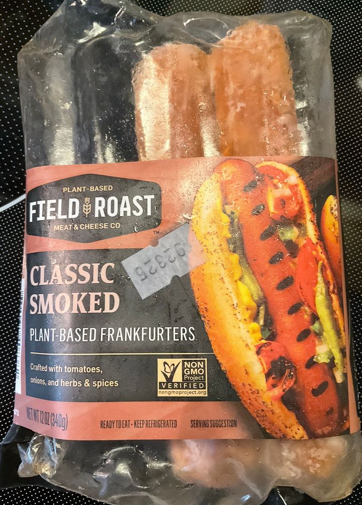 Photo of vegan hot dogs 

PLANT-BASED
FIELD ROAST MEAT & CHEESE CO
CLASSIC SMOKED
PLANT-BASED FRANKFURTERS
Crafted with tomatoes, onions, and herbs & spices
NON-GMO VERIFIED
READY TO EAT - KEEP REFRIGERATED
