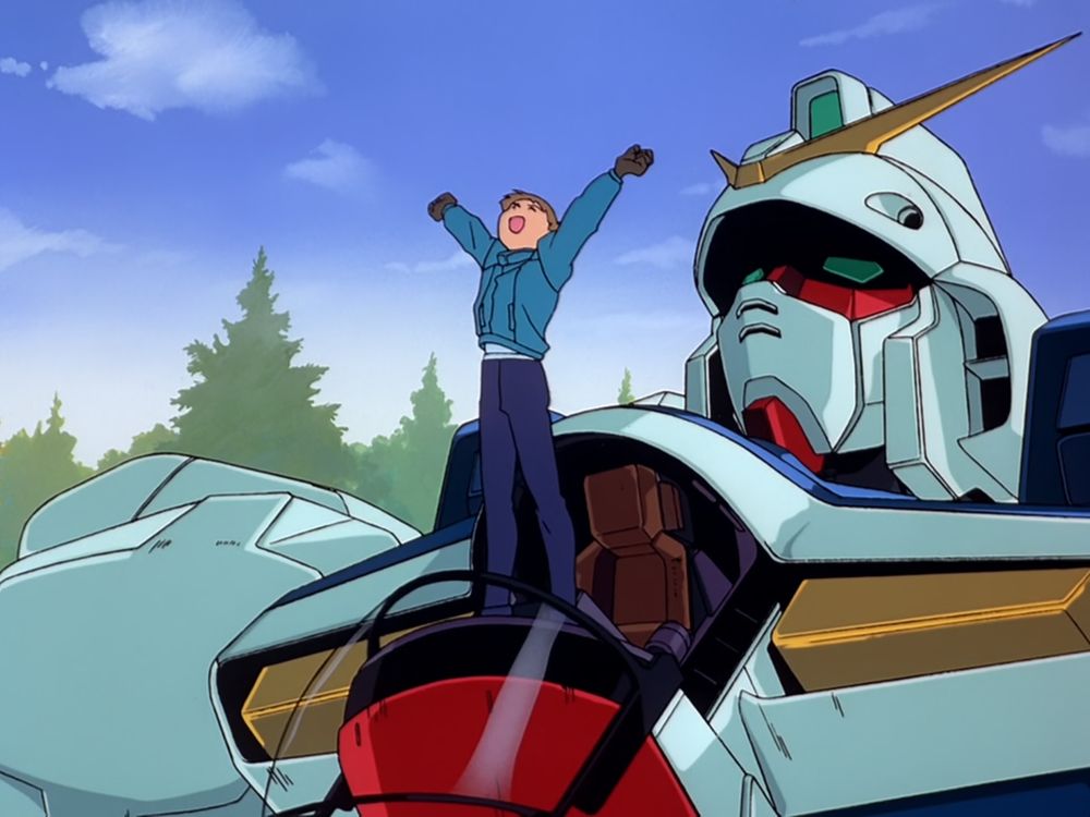 Fora do cockpit do Victory Gundam, Uso comemora sua primeira vitória a bordo do Mobile Suit (Episódio 1 de "Mobile Suit Victory Gundam").