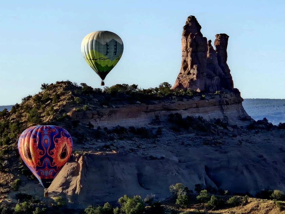 Fractal balloon and friend in front of the spires of Church Rock